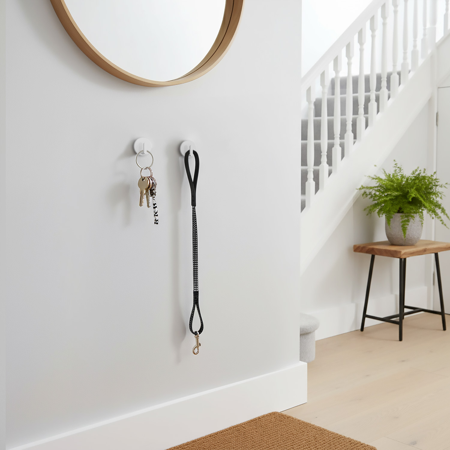 BYSMAH adhesive hooks used in a home hallway